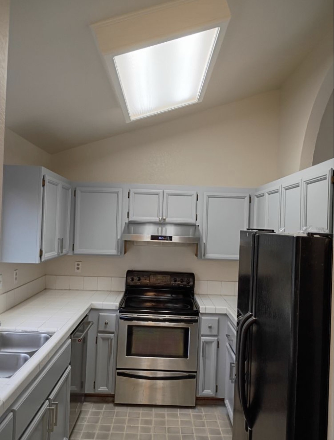 Kitchen cabinet repaint — after