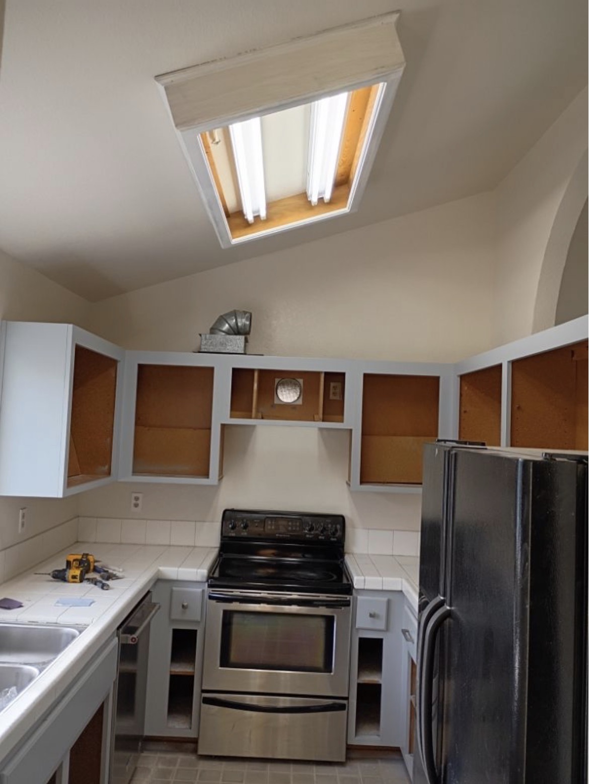 Kitchen cabinet repaint — before